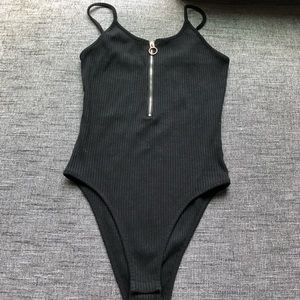 Ribbed body suit with zipper detail